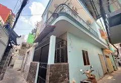 Nhà lô góc 2 tầng thoáng mát, hẻm thông các ngã, giá tốt... Bán nhà riêng tại Nhiêu Lộc, Hồ Chí Minh 07