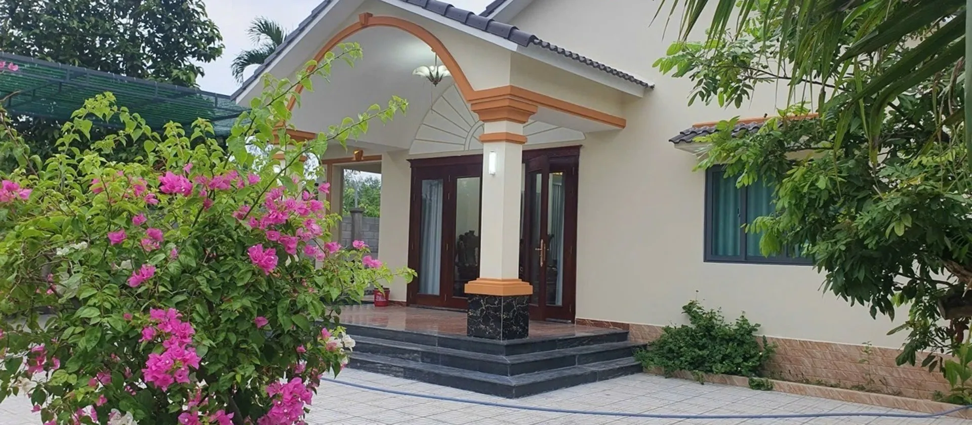 Villa sang trọng sân vườn rộng tại Củ Chi – Không gian nghỉ dưỡng lý tưởng... Bán nhà mặt phố tại Nhuận Đức, Hồ Chí Minh 01