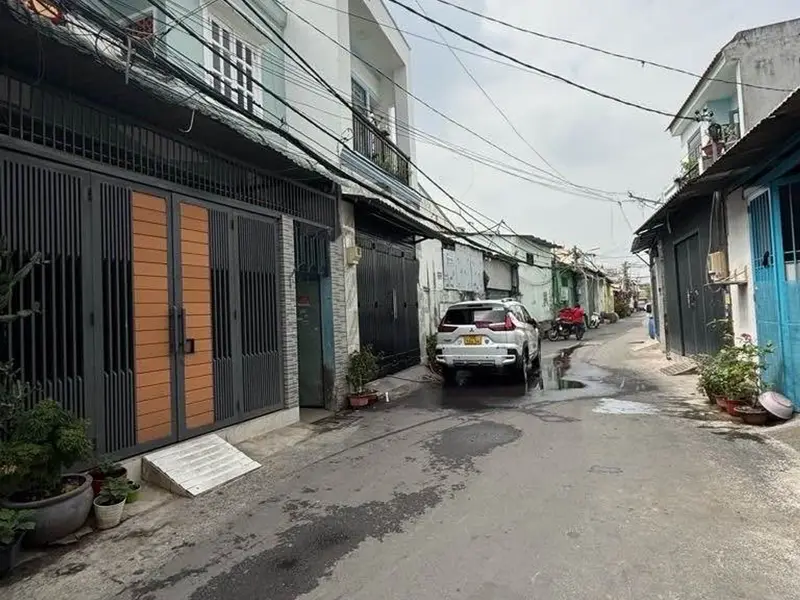 Nhà 2 tầng 4PN ngay chợ Lạc Quang, giá tốt giảm 200tr... Bán nhà riêng tại Đông Hưng Thuận, Hồ Chí Minh 01